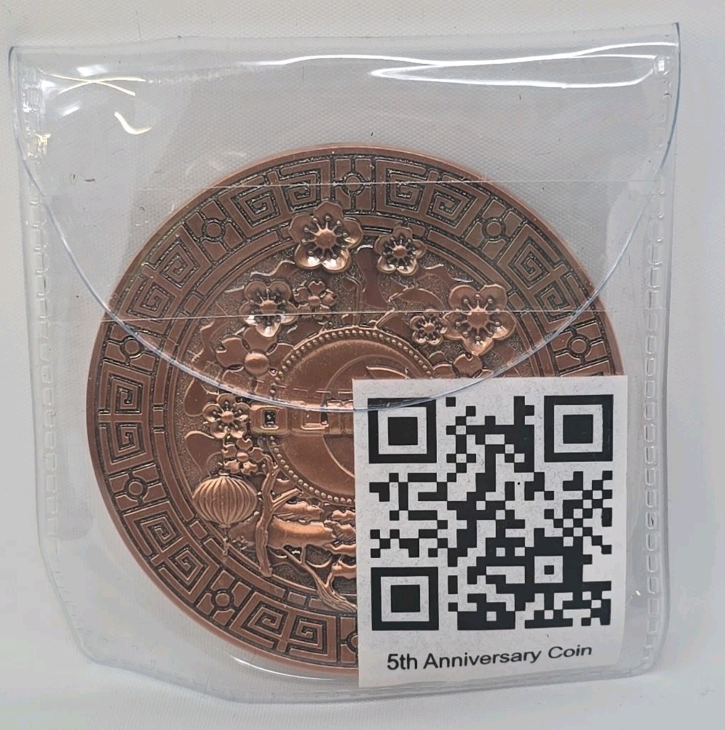 Olight 5 year anniversary coin
