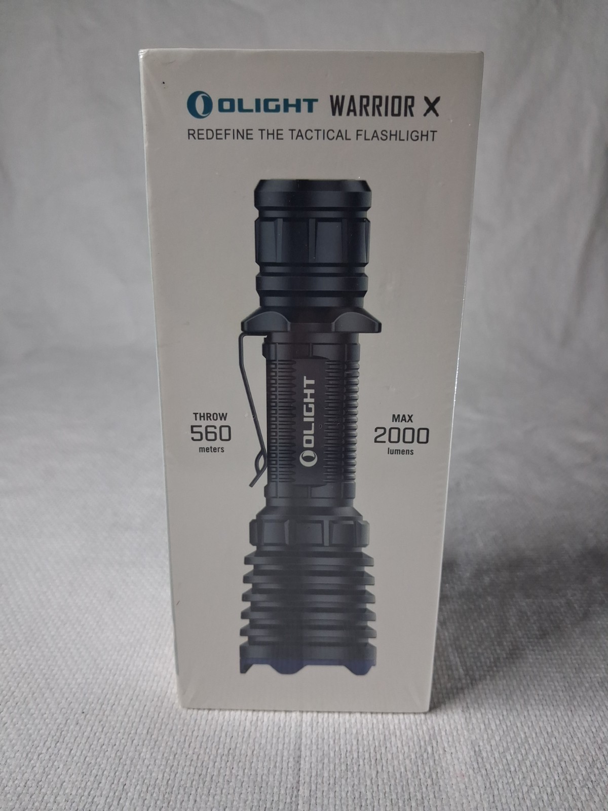 Olight Warrior X 2000 Lumens 560 Throw Tactical Flashlight **SEALED**