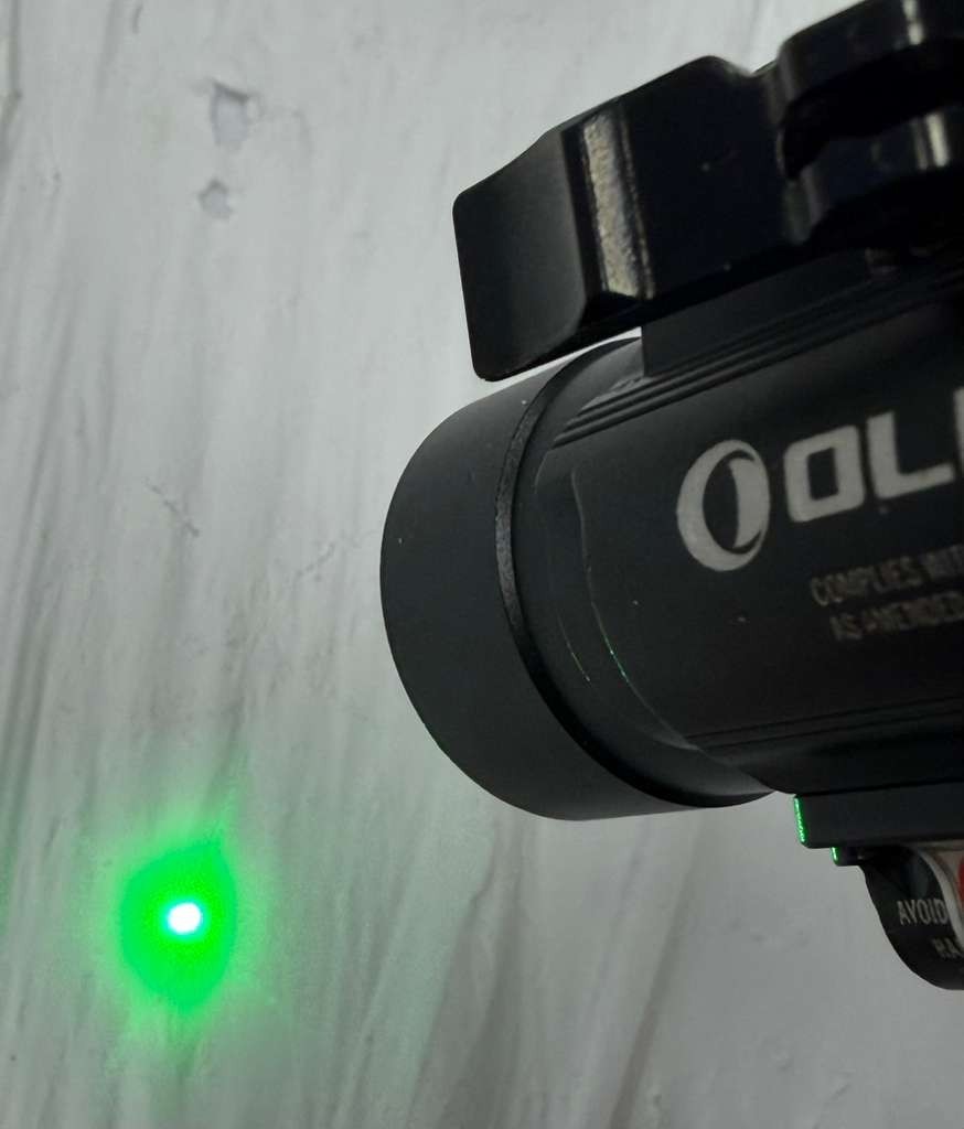 Used Olight Baldr Pro 1350 Lumen Pistol Flashlight w/ Green Laser Sight (Black)