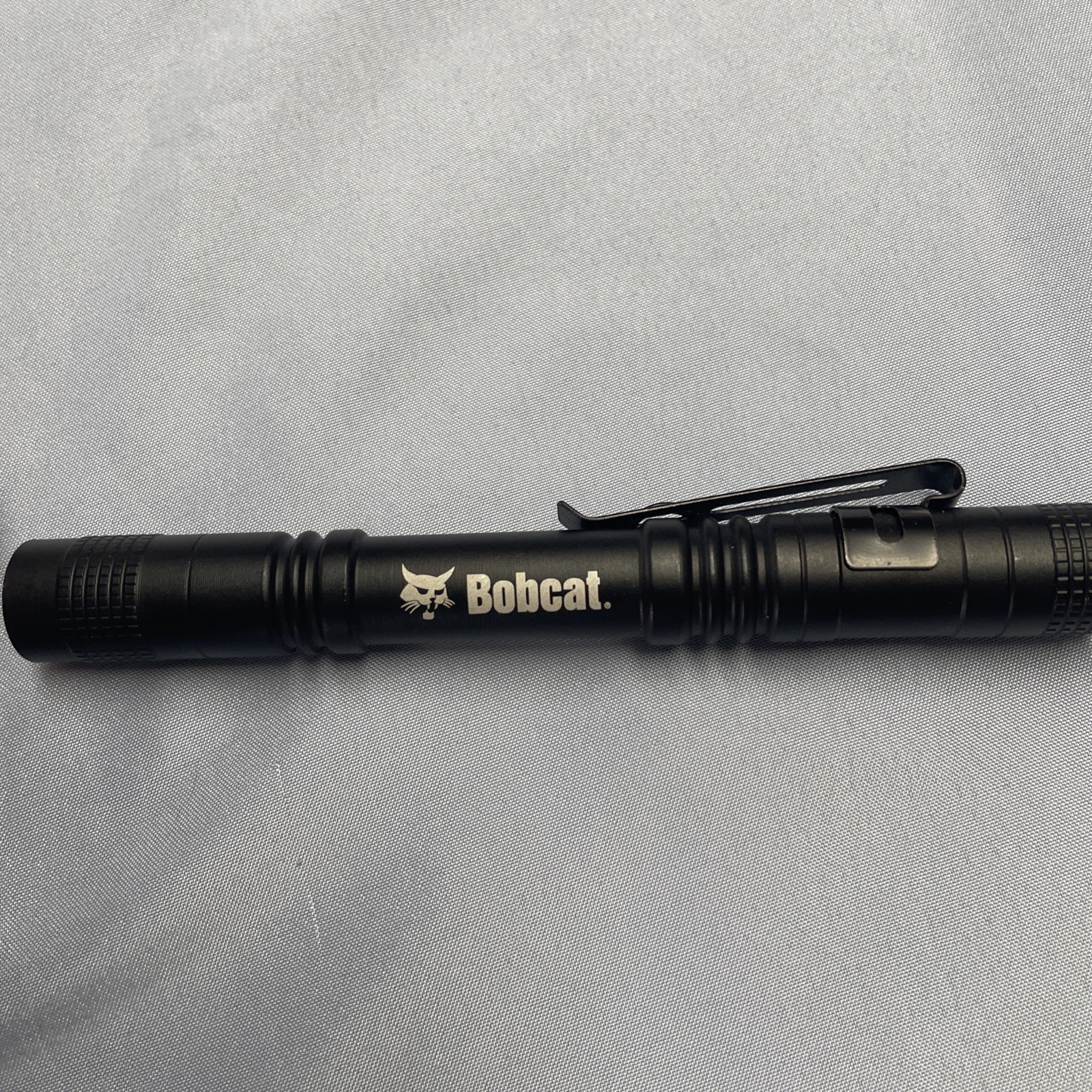 Bobcat 150 Lumen Flashlights w/ Pocket Clip. (Batteries included) New