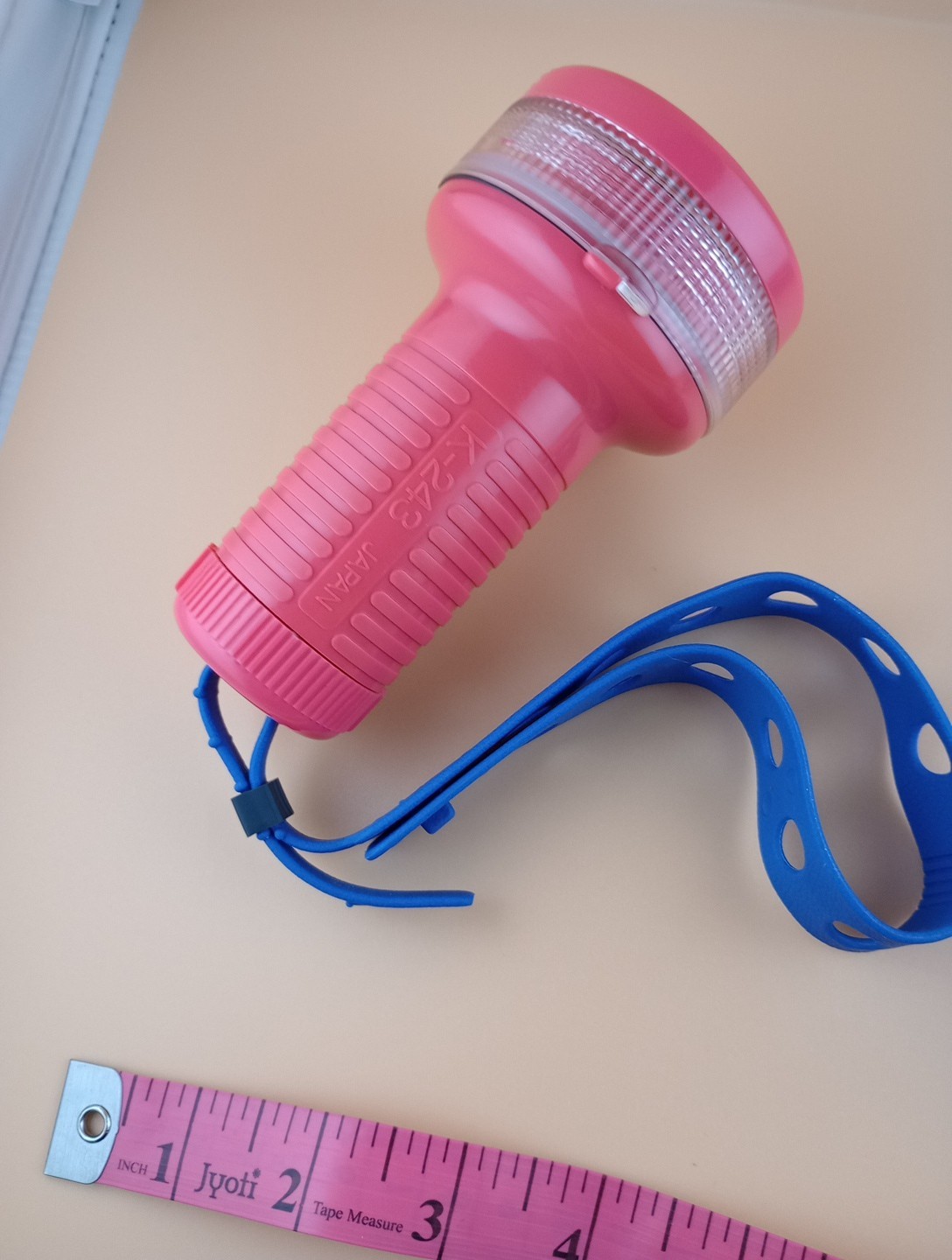 Toshiba Underwater Flashlight with rubber strap, vintage, working, reddish-pink