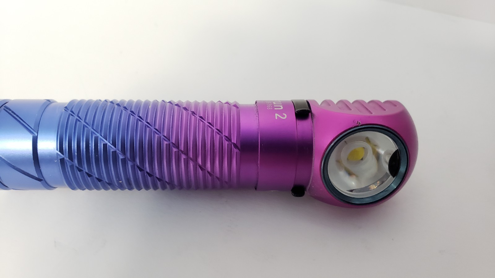 OlightPerun2 (Limited Edt. Purple)Flashlight and charge cable only.good cond.
