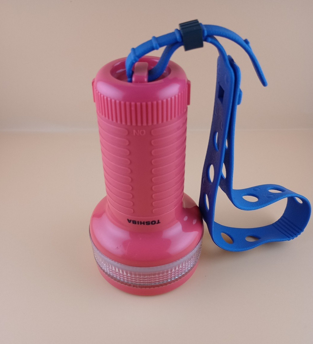 Toshiba Underwater Flashlight with rubber strap, vintage, working, reddish-pink