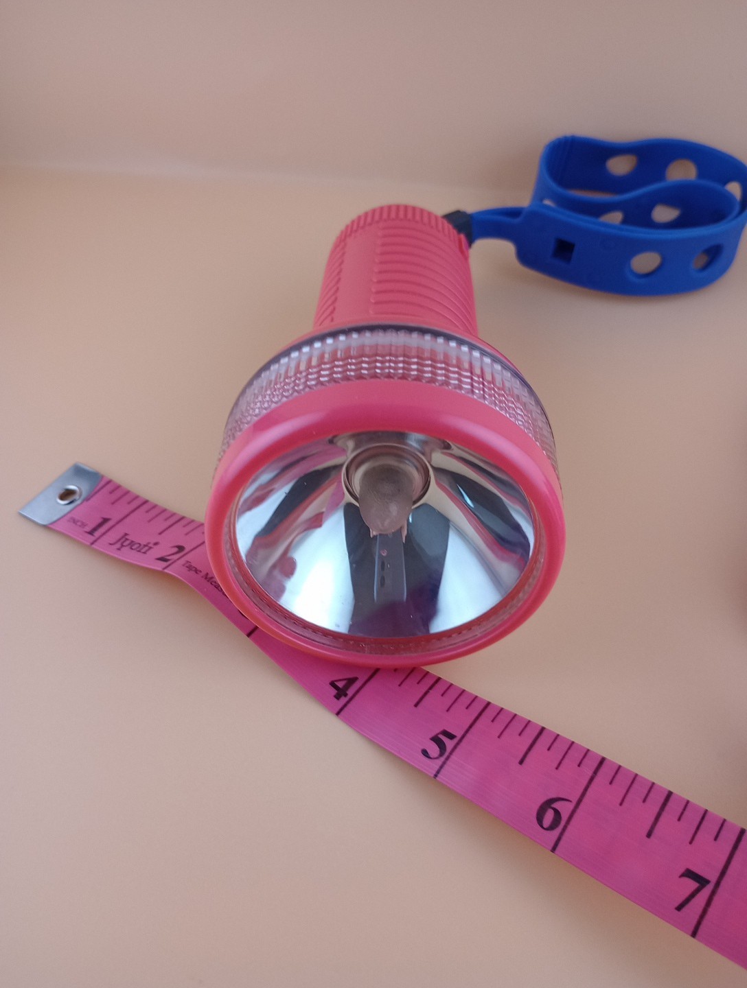 Toshiba Underwater Flashlight with rubber strap, vintage, working, reddish-pink