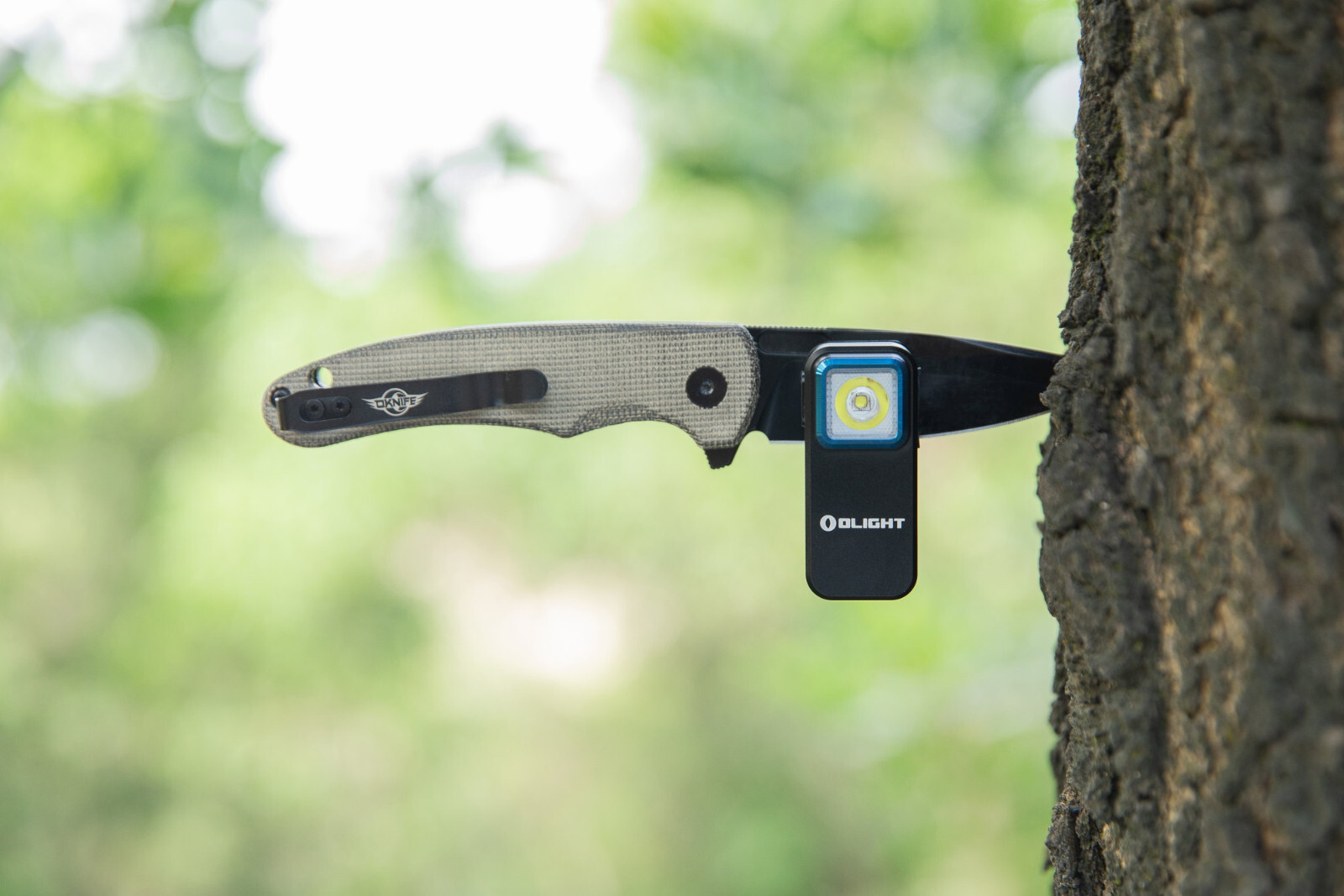 Olight Oclip Clip Light with White and Red Clip-on Light, 300 Lumens, 70 Meters