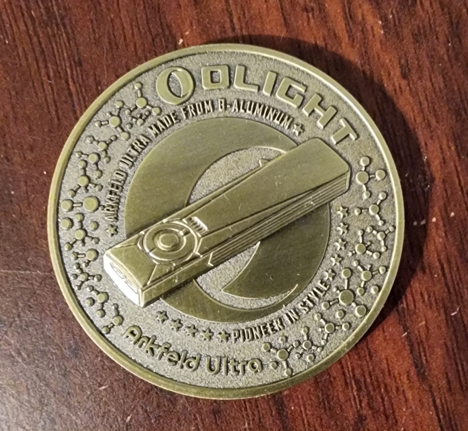 Olight Arkfeld Ultra Flashlight Challenge Coin, O-Aluminum, Pioneer in Style