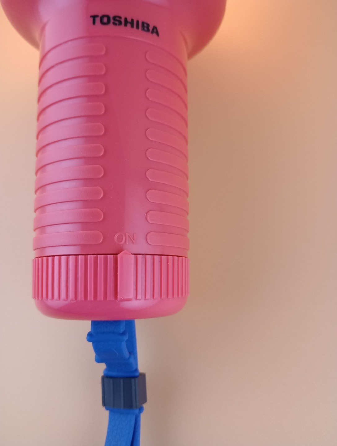 Toshiba Underwater Flashlight with rubber strap, vintage, working, reddish-pink