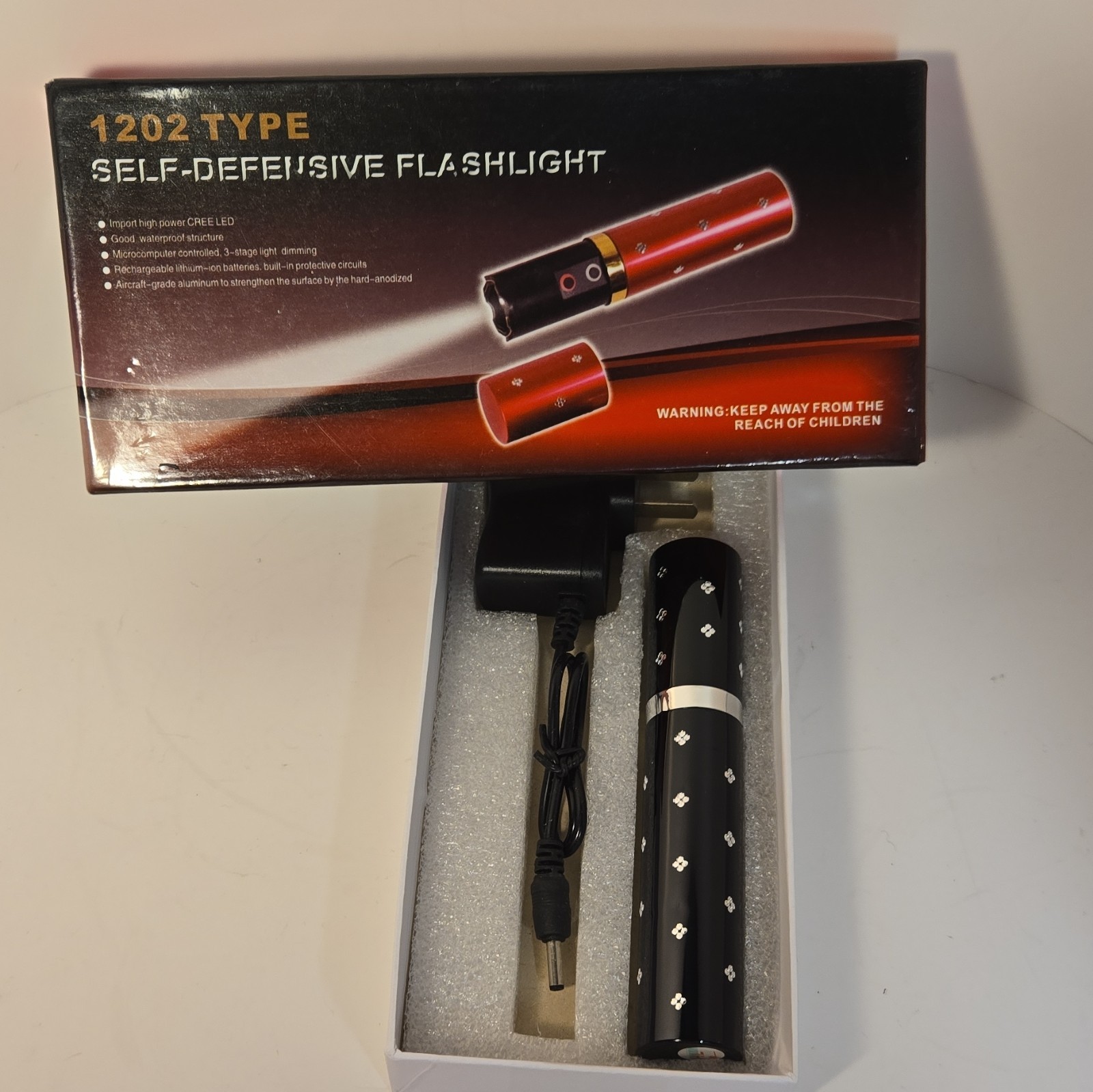 1202 Type Self-Defensive LED Flashlight Black Rechargeable Solar IP67 50lm