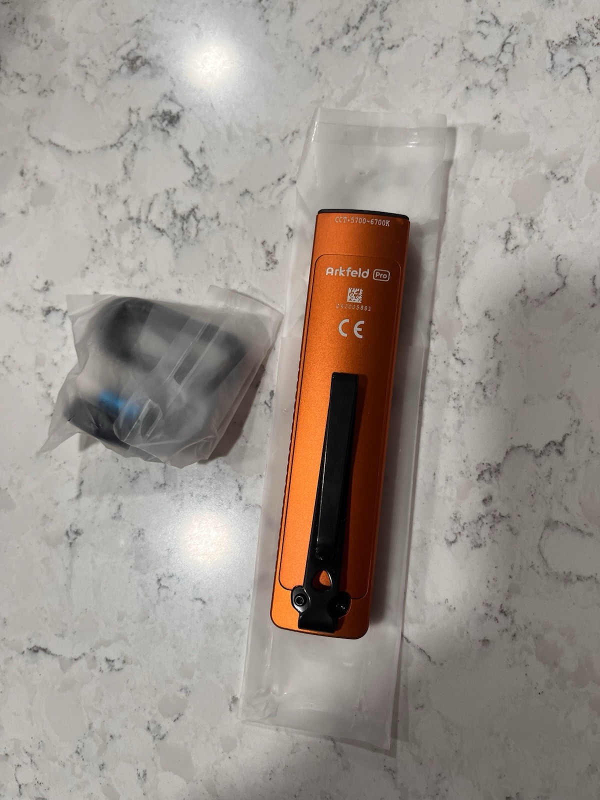 Olight Arkfeld Pro 1,300 Lumens Rechargeable Magnetic Clip LED IP56 Orange