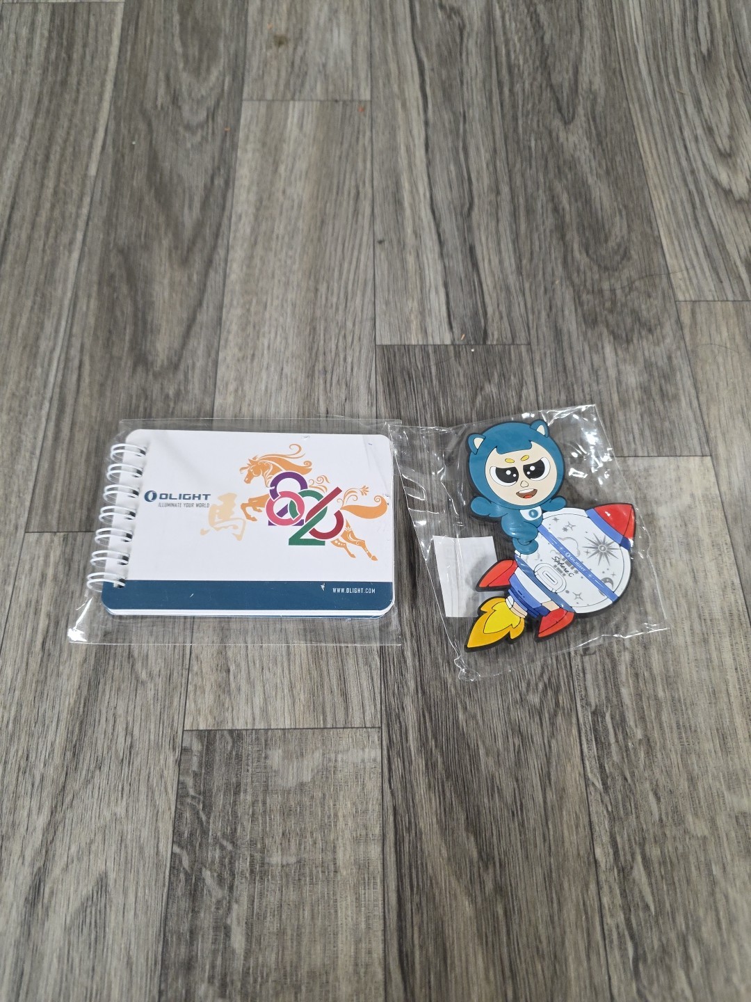 Olight Swag – Sphere C Fridge Magnet And 2026 Calendar