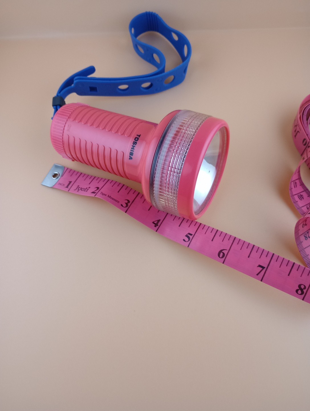 Toshiba Underwater Flashlight with rubber strap, vintage, working, reddish-pink