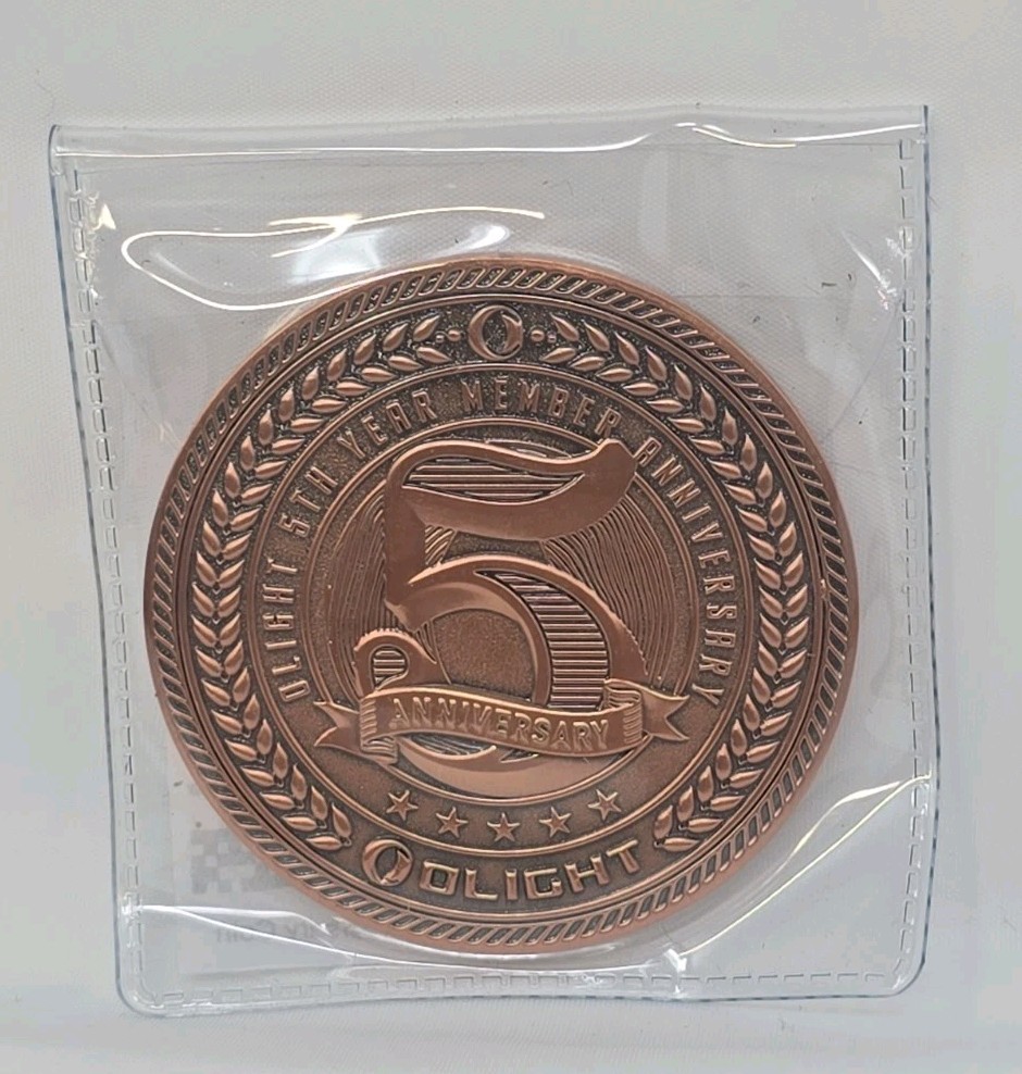 Olight 5 year anniversary coin