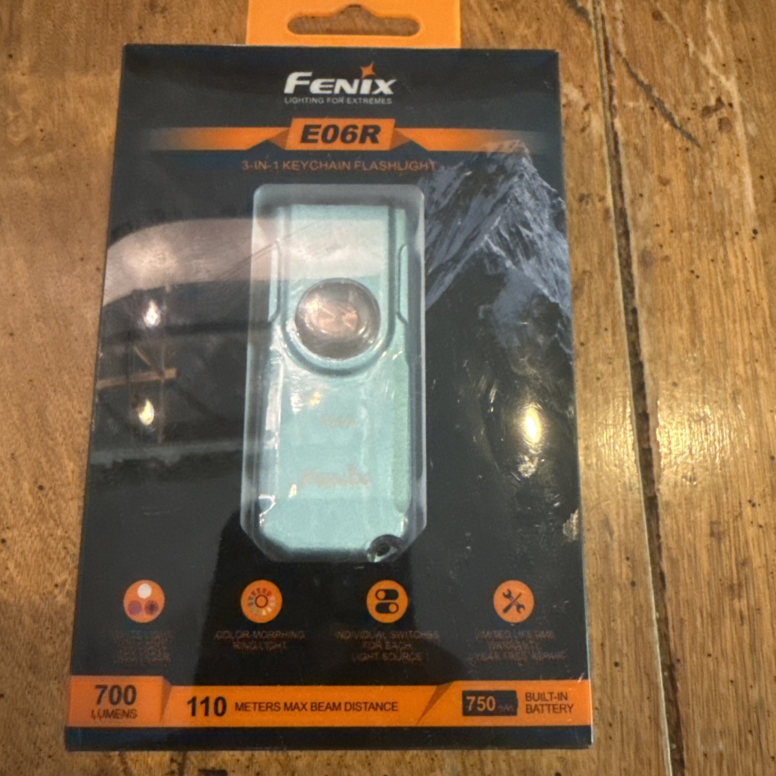 Fenix E06R 700 Lumen Rechargeable EDC Flashlight with UV Light & Red Laser -Turq