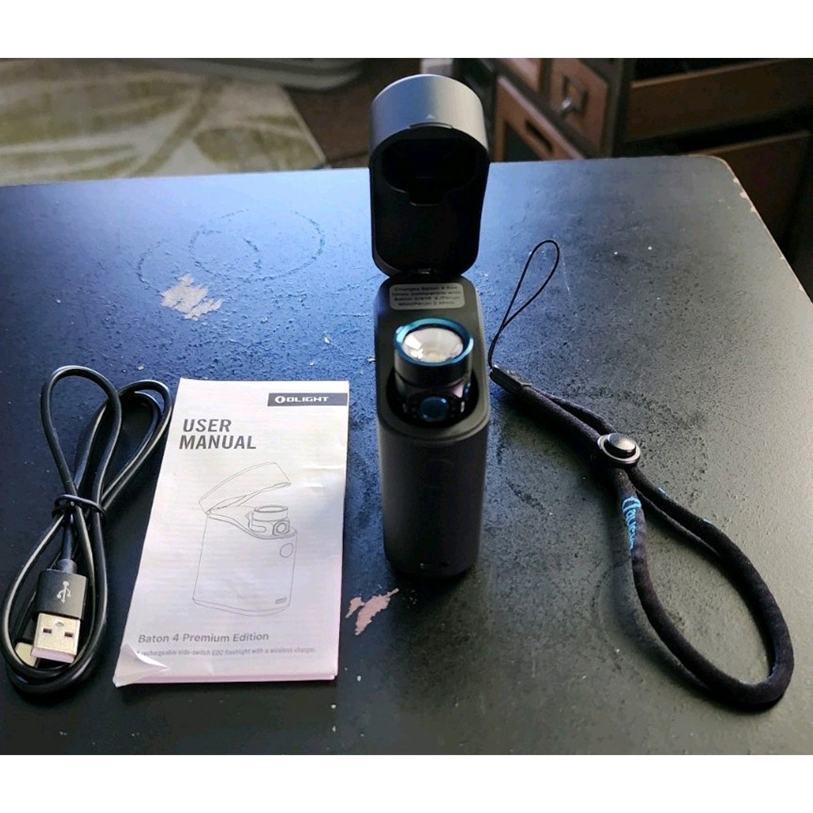 Olight Baton 4 Premium Edition 1300-Lumen EDC Flashlight & Wireless Charge Case